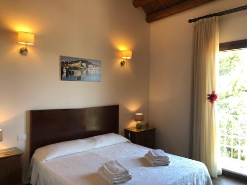 A bed or beds in a room at B&B SiciliAntica