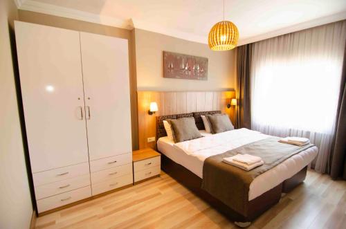 Katil atau katil-katil dalam bilik di Nova Suite Residence