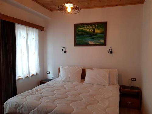 Postel nebo postele na pokoji v ubytování The Heart of the Bazaar Guest house