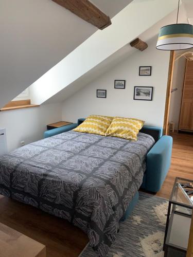 Кровать или кровати в номере Appart LH L'Estuaire - F2 vue mer proximité plage