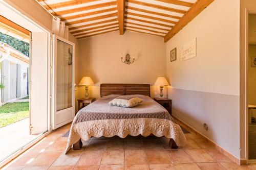 Postel nebo postele na pokoji v ubytování Jade En Provence