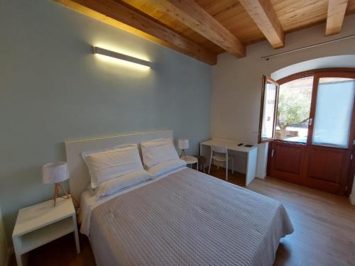 Posteľ alebo postele v izbe v ubytovaní Casa Fadda