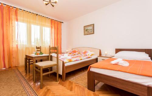 Posteľ alebo postele v izbe v ubytovaní Appartment Rezika
