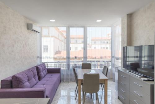 Posezení v ubytování Dream House Rooms Malaga - Habitacion en el apartemento