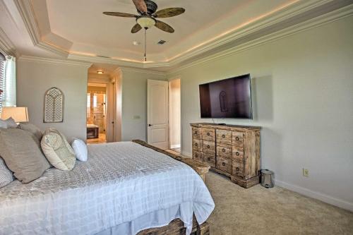 a bedroom with a bed and a ceiling fan at Blue Ridge Home with Game Room 14 Mi to McKinney! in Blue Ridge