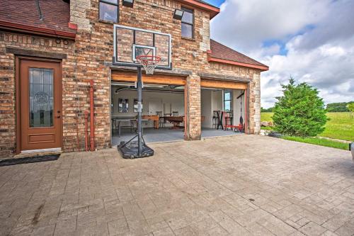 a basketball hoop in front of a brick building at Blue Ridge Home with Game Room 14 Mi to McKinney! in Blue Ridge