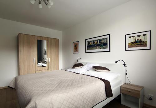 Posteľ alebo postele v izbe v ubytovaní Apartmán Valérie, byt Valtice