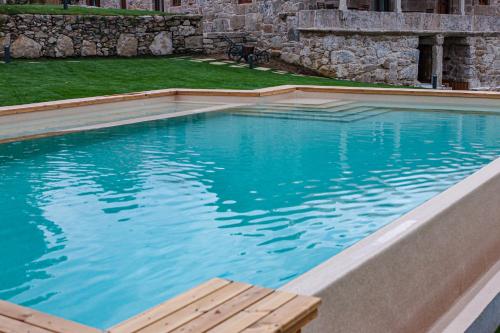 Piscina a Hotel La Rectoral o a prop