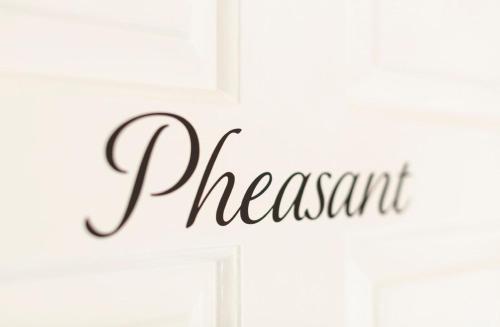 a sign that reads pageant on a door at The Fromeway in Radstock