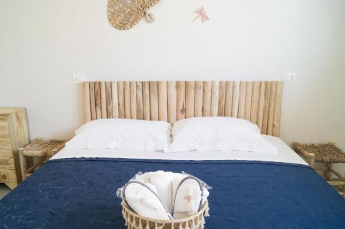 Posteľ alebo postele v izbe v ubytovaní Casa vacanza a 10 metri dal mare