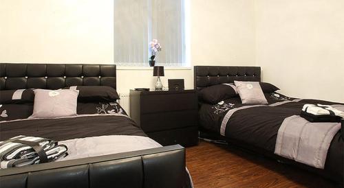 Postel nebo postele na pokoji v ubytování Lewis Apartment 1 Northern Quarter Sleeps Upto 4