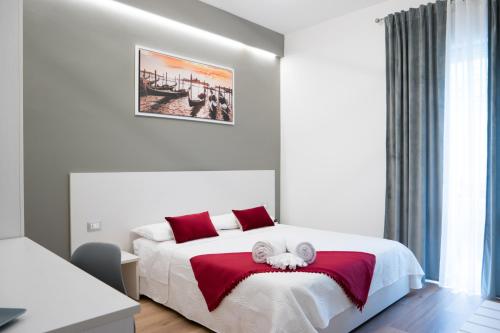 Posteľ alebo postele v izbe v ubytovaní Venice Rooms