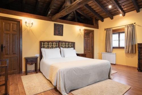 Кровать или кровати в номере Pazo de Moreda