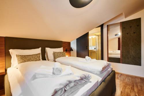 Ένα ή περισσότερα κρεβάτια σε δωμάτιο στο EVI APARTMENTS via we rent