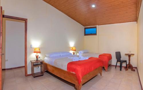 Ένα ή περισσότερα κρεβάτια σε δωμάτιο στο Hotel Casa Madonna
