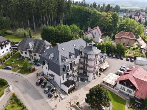 an aerial view of a large house in a city at Willa Spa Scaliano in Kudowa-Zdrój