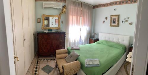 En eller flere senge i et værelse på Casa Antica Savoia