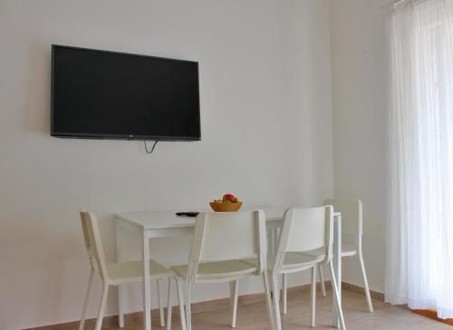 TV a/nebo společenská místnost v ubytování Apartmani Bodo