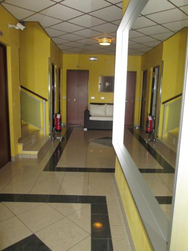 a hallway of a hospital with a bed in a room at Appartamenti Katja in Bibione