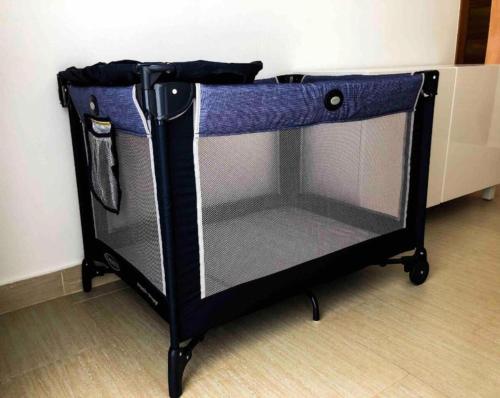 a black bunk bed in the corner of a room at Residencial Mañanero in Cabarete