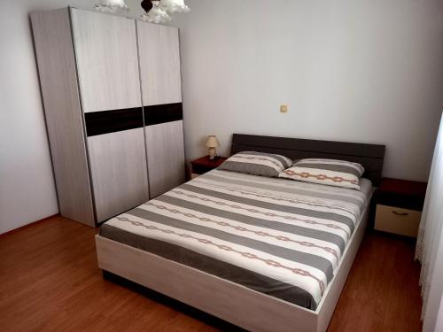 Postel nebo postele na pokoji v ubytování Apartment Pejic