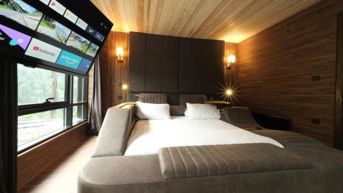 Letto o letti in una camera di Ayder Villa de Pelit Hotel