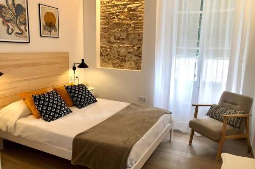 Postel nebo postele na pokoji v ubytování GATU PREMIUM Villa Libertad