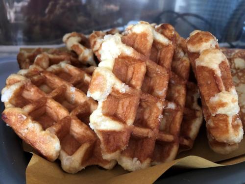 a pile of waffles sitting on top of a table at Hotel Svizzera in Arma di Taggia