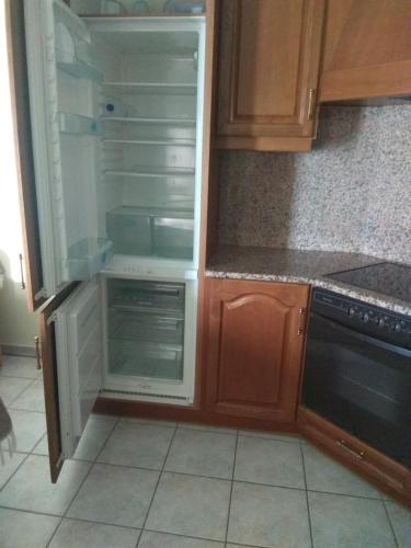 Η κουζίνα ή μικρή κουζίνα στο Simos Apartments