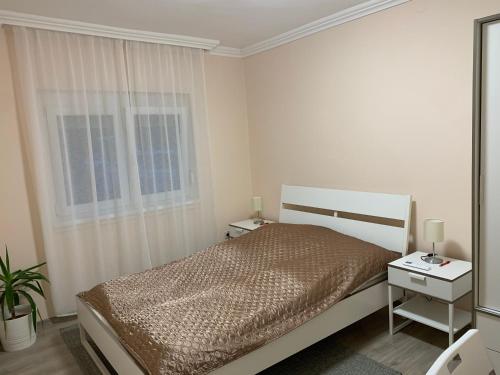 Ένα ή περισσότερα κρεβάτια σε δωμάτιο στο Balatonmáriafürdő nyaraló