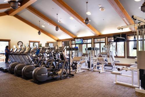 a gym with treadmills and elliptical machines at New Listing In The NEW Signature Collection At Old Greenwood! in Truckee