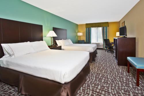 Кровать или кровати в номере Holiday Inn Express Hastings, an IHG Hotel