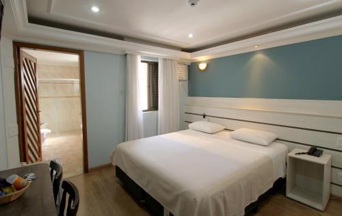 Krevet ili kreveti u jedinici u objektu Gran Chevalier Hotel