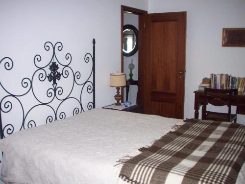 Un pat sau paturi într-o cameră la Casa da Moagem - Serra do Açor