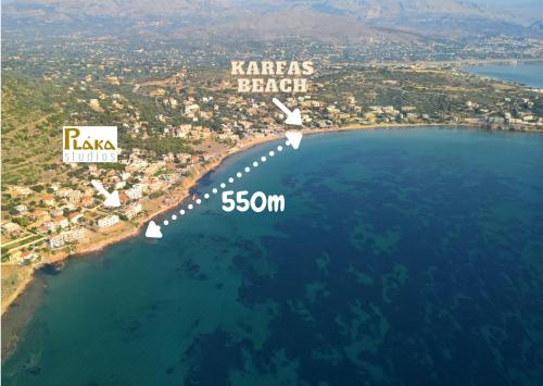 an aerial view of the island of karras beach at Plaka Studios in Karfas