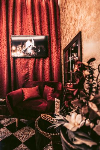 Alfons Boutique Hotelにあるテレビまたはエンターテインメントセンター