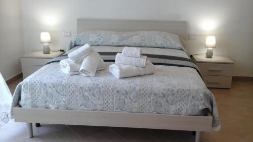 Posteľ alebo postele v izbe v ubytovaní Casa Vacanza Da Sofì