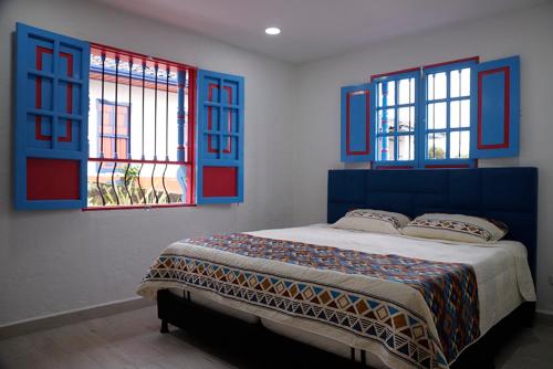מיטה או מיטות בחדר ב-Casa Adelina