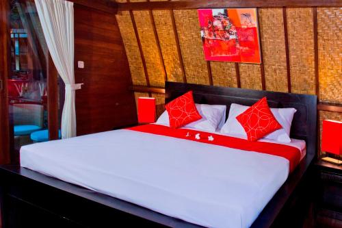 Ένα ή περισσότερα κρεβάτια σε δωμάτιο στο D'Wahana Resort