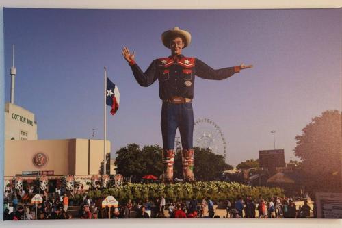 a large statue of a man standing in front of a crowd at Dallas 4BR Large yard w HOT TUB , Fire pit and basketball Hoop in Dallas