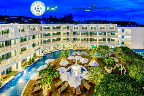an aerial view of the resort at night at Andaman Seaview, Karon Beach - SHA Plus in Karon Beach