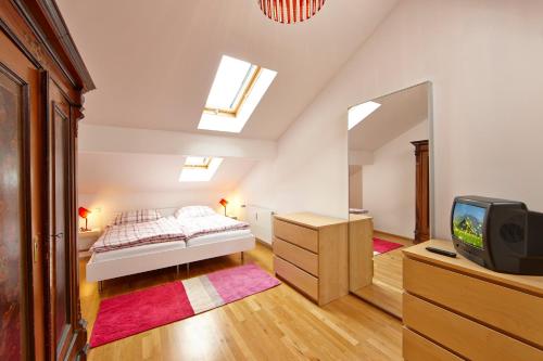 Säng eller sängar i ett rum på Luftikus Lodge