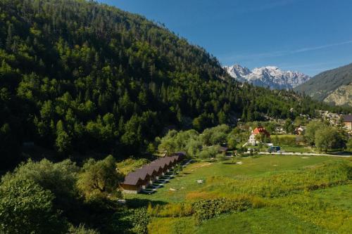 a scenic view of a lush green hillside at Villas Jezerca in Valbonë
