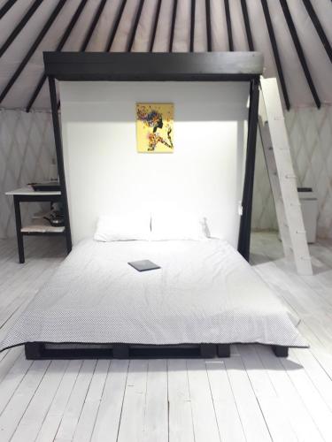 Una cama o camas en una habitación de Глемпінг luxury