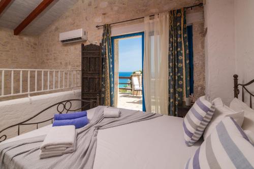Postel nebo postele na pokoji v ubytování Astarte Villas - Beach Villa Nout