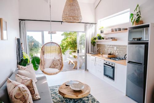 Η κουζίνα ή μικρή κουζίνα στο Skoon Seaside Accommodation