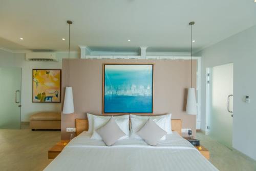 Ένα ή περισσότερα κρεβάτια σε δωμάτιο στο Deep Blue Villa Umeanyar