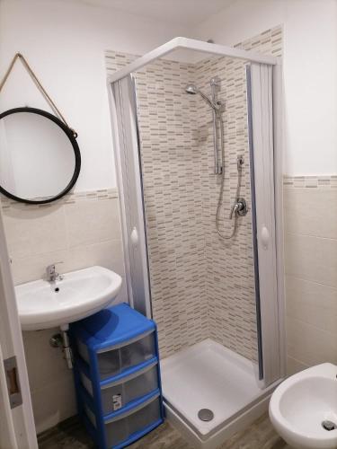 a bathroom with a shower and a sink at la casetta in Termini Imerese