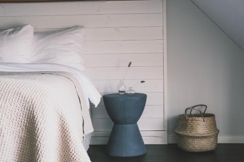 A bed or beds in a room at Skärgårdshotellet Hönö