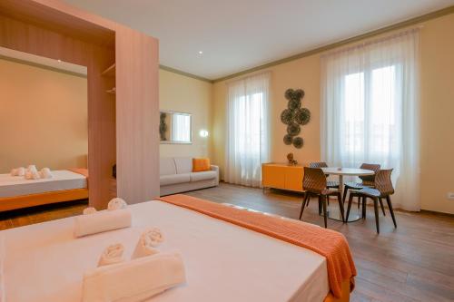 En eller flere senge i et værelse på Attico di Via d'Azeglio